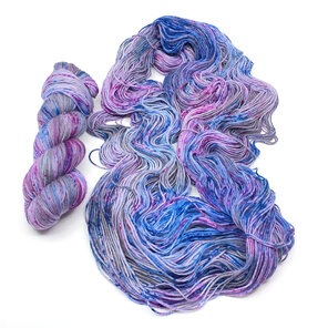 2 skeins of 4ply variegated yarn in soft greys, blues, pinks w speckles