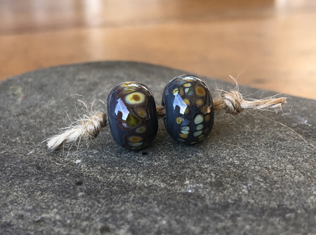 2x handmade glass beads - frit - jitterbug on dark matter