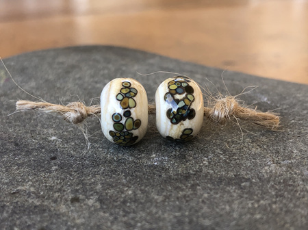 2x handmade glass beads - frit - jitterbug on ivory