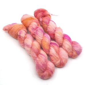 3 twisted skeins brushed suri alpaca and silk in peaches pinks and golden yellow