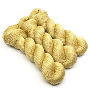3 twisted skeins of 4ply merino/silk in ginger hues