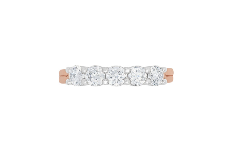 5 stone eternity ring with koru detailing from The Narrative Collection