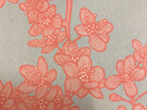 A beautiful cherry blossom fabric features on the front of this large handbag