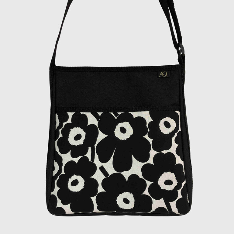 A black and white handbag in a Marimekko fabric perfect for everyday use.