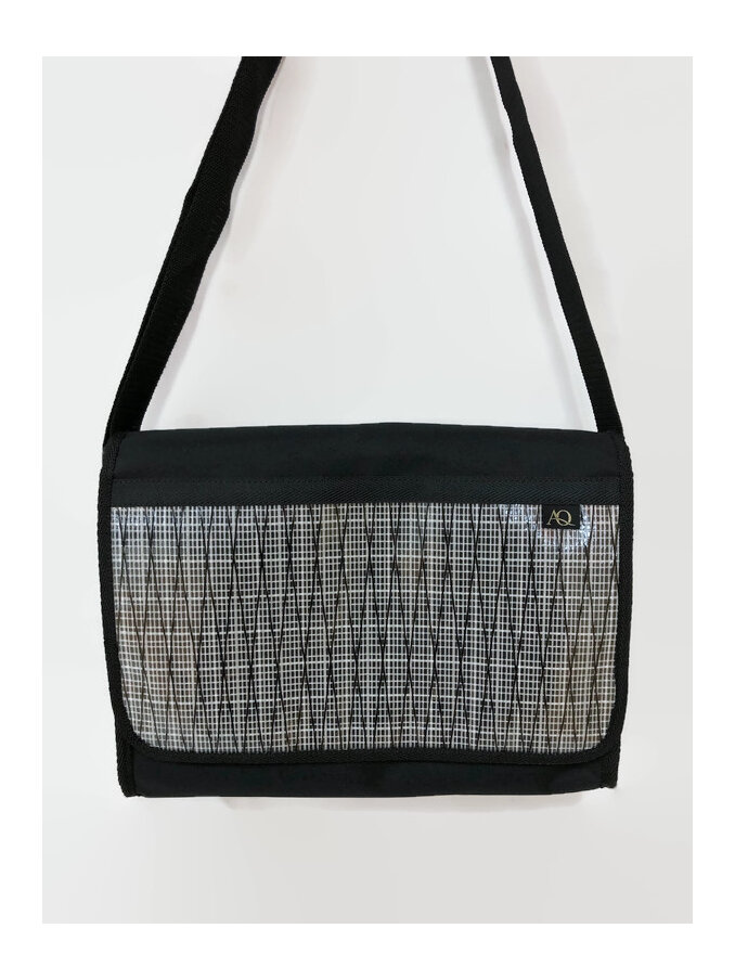 A black and white sailcloth laptop bag perfect for work or play.