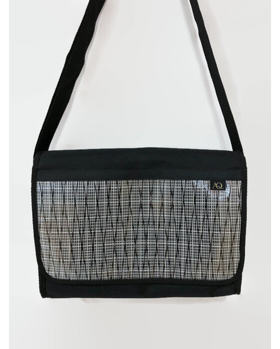A black and white sailcloth laptop bag perfect for work or play.