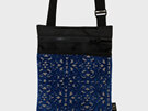 A bright blue textured crossbody bag made for durability and style.