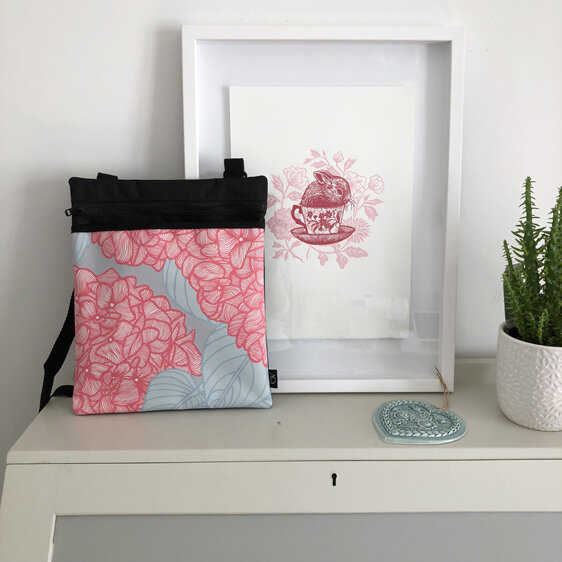 A crossbody bag in a hydrangea fabric perfect for everyday. NZ made.