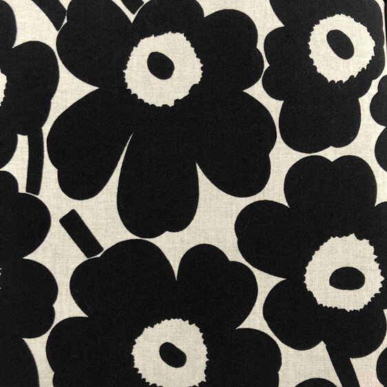 A designer bag in the Marimekko poppy fabric in black and white.