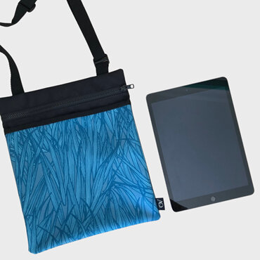 A flat comfortable handbag suitable for an iPad, made in NZ