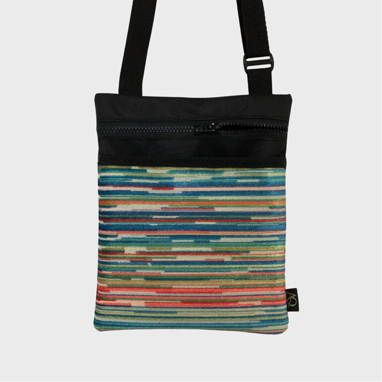 A fun striped colourful fabric bag, made for durability and style.