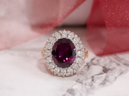 A Garnet Garland - Malaia Garnet and Diamond Ring