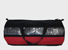 A gear/sports bag with carbon sailcloth panel and red, perfect for sailing gear