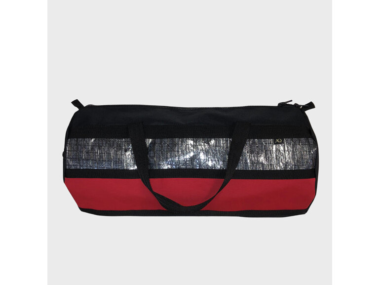 A gear/sports bag with carbon sailcloth panel and red, perfect for sailing gear