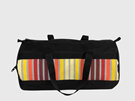 A great cabin bag in a rainbow stripe for travelling on a plane, made in NZ