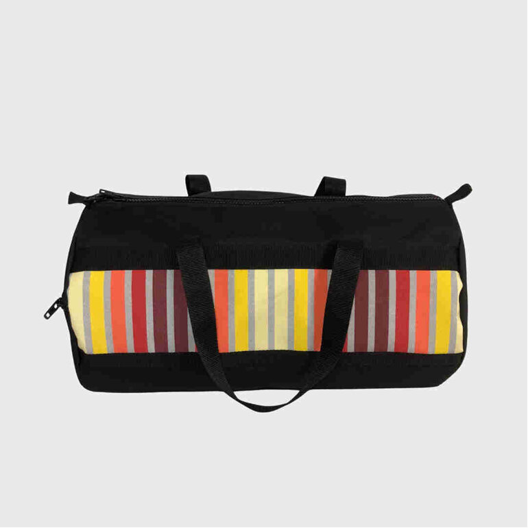 A great cabin bag in a rainbow stripe for travelling on a plane, made in NZ