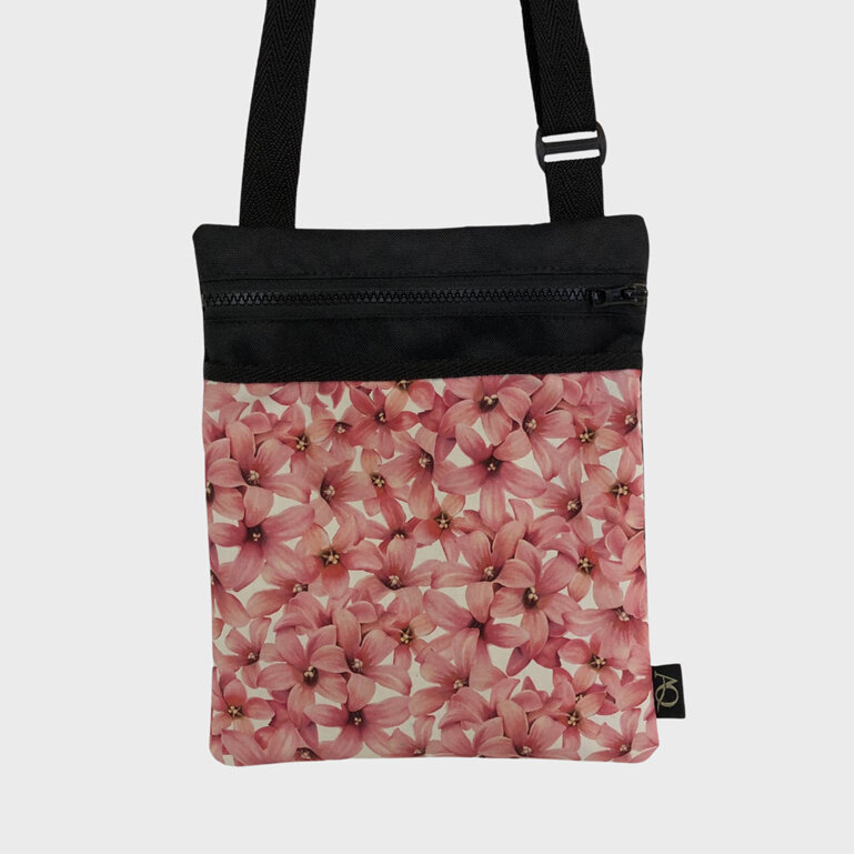 A hands-free bag for your daily walks in a hydrangea fabric. NZ made