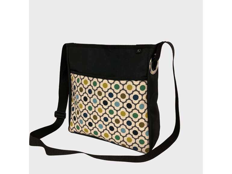 A laptop bag featuring an Orla Kiely retro flower fabric.  NZ made