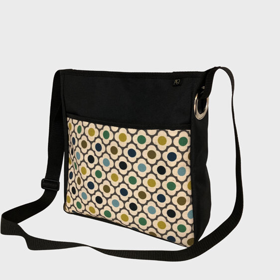 A laptop bag featuring an Orla Kiely retro flower fabric.  NZ made