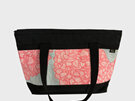A large carryall bag with a zip suitable for a laptop making it a great workbag