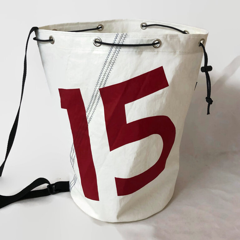 A large duffle with numbers 15 on the front, made of upcycled sailcloth