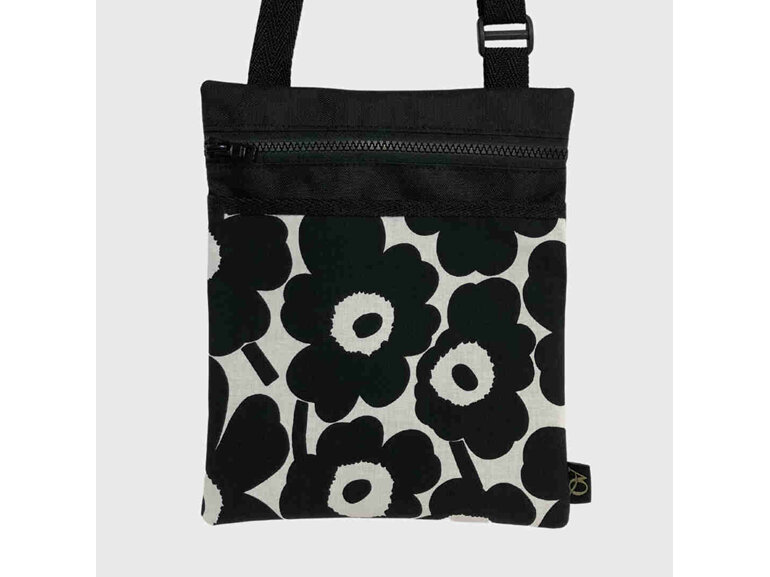 A Marimekko designer fabric bag to wear flat on your body.