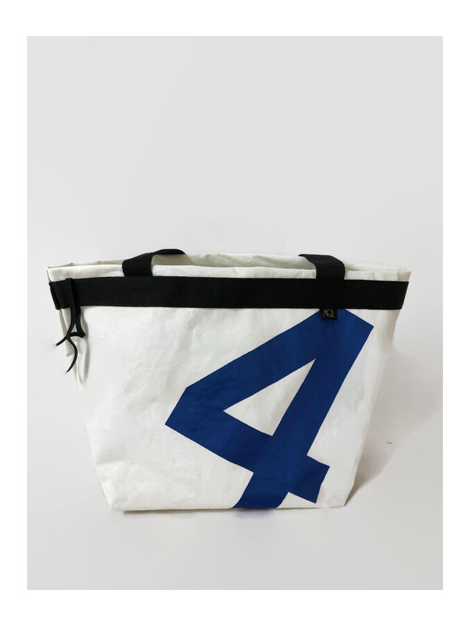 A number 4 is on the back of the recycled sailcloth shopping bag