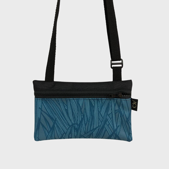A phone bag in leaf blue fabric perfect for out walking the dog