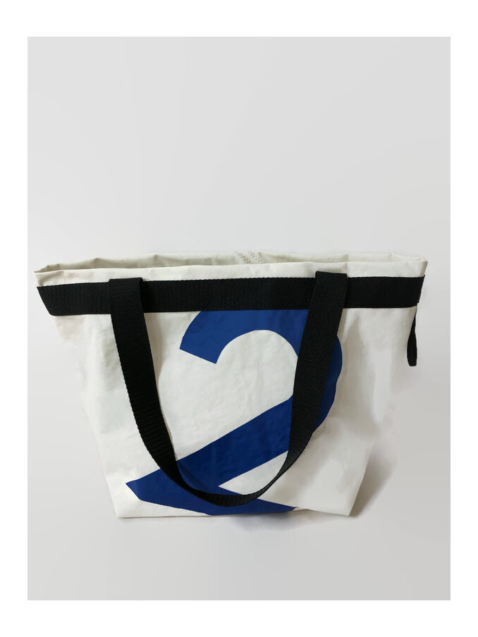 A shopping or grocery bag with number 2 on the front made of sailcloth.