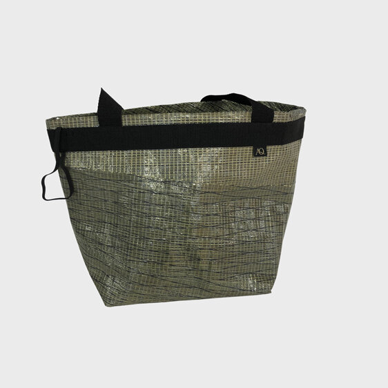 A supermarket shopping bag made from a recycled Ross 930 sail.