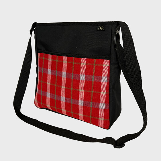 A tarten crossbody bag perfect for your work or the weekend.