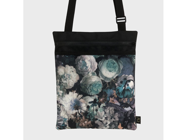 A Warwick fabric bag with a design of peonies, daisies and roses.