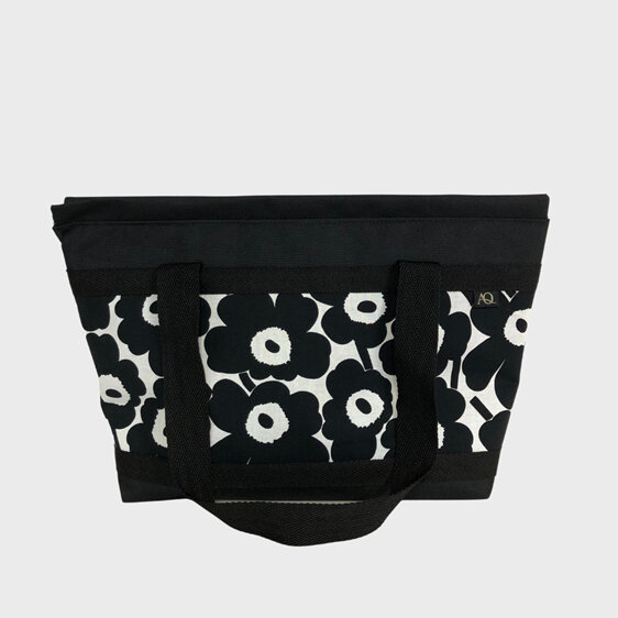 A zippered handbag large enough for a laptop made in Marimekko fabric