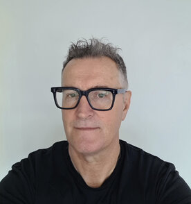 Adrian Keane - Publisher and Director