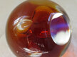 Amber glass paperweight
