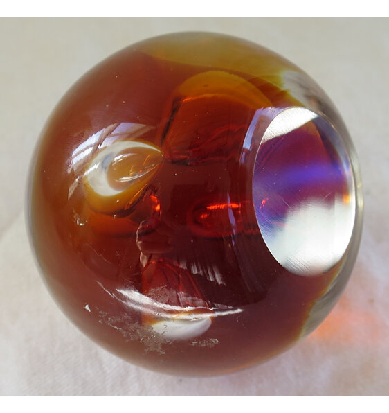 Amber glass paperweight