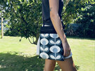 An Orla Kiely fabric crossbody bag that fits an iPad and more.
