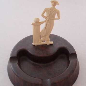 Art Deco gent decoration on bakelite ashtray