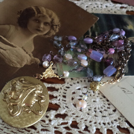 Art Nouveau style Cameo locket with Shades of Mauve beaded chain