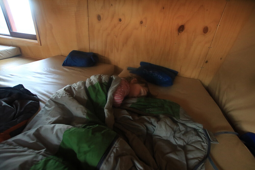 babies sleeping doc hut child hiking tramping nz