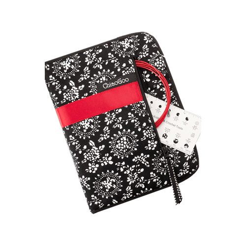 black and white case with red band, with side zip with red cable and white gauge