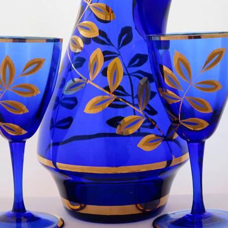 Blue and gold decanter and glasses