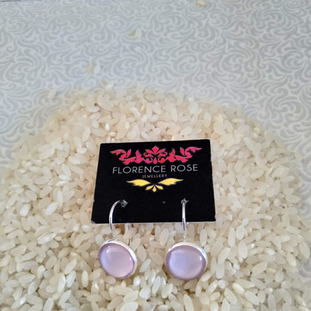 Cabochon Lever earrings block colours: pinks, purples, black