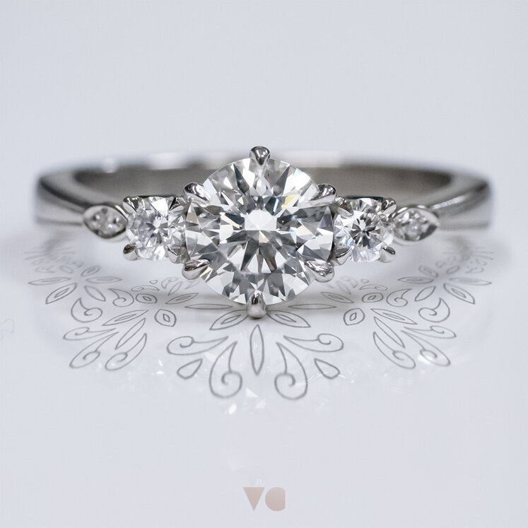 Celtic inspired diamond three stone ring 18ct white gold platinum milgrain edge