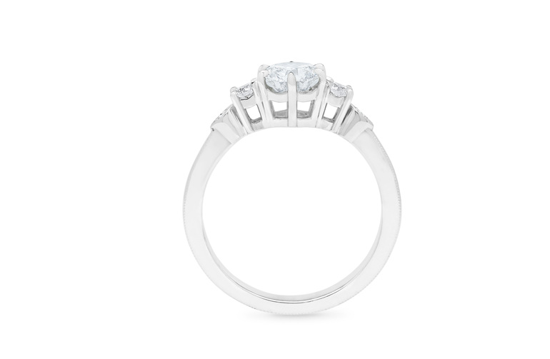 Celtic inspired platinum 18ct white gold diamond three stone engagement ring