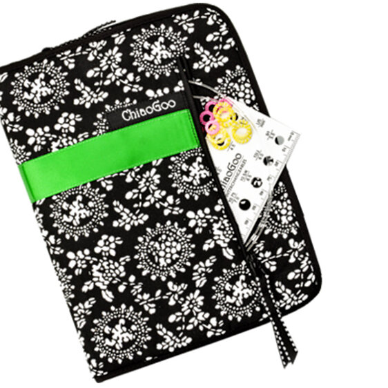 ChiaoGoo black and white needle case with green ribbon and needle gauge