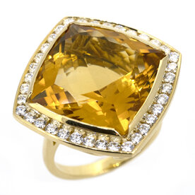 Citrine yellow gold ring with diamond halo