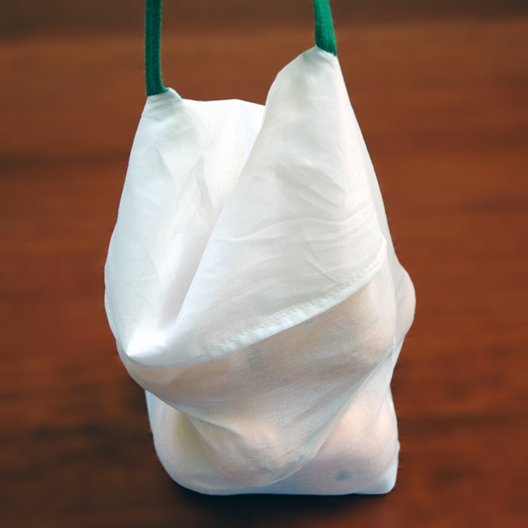 cotton produce bag handle in use