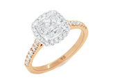 Cushion cut diamond halo cluster engagement ring in platinum 18ct rose gold