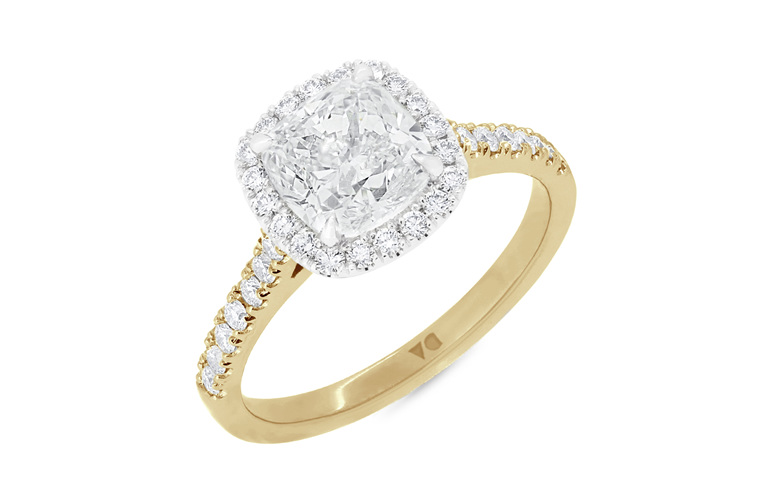 Cushion cut diamond halo cluster engagement ring in platinum 18ct yellow gold